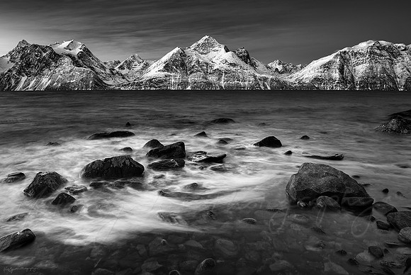 A black and white photo of the Lyngenalps and Lyngenfjord in Norway by photographer Mieke Boynton