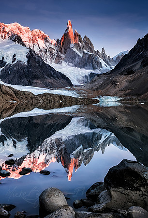 Mountain reflections at Lago Torre in Patagonia Argentina by photographer Mieke Boynton
