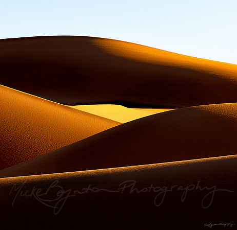 Sunlit sand dunes in the Sahara Desert Morocco by photographer Mieke Boynton