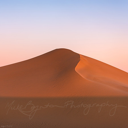 Sand dune at sunrise