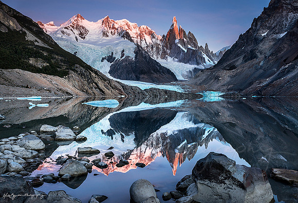 Reflections of Cerro Torre mountain at Lago Torre Patagonia Argentina by photographer Mieke Boynton